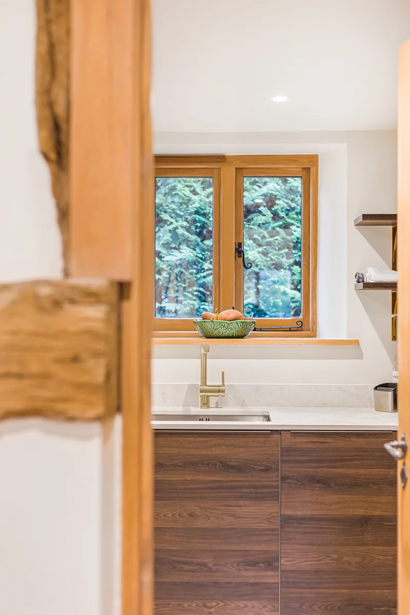 Framed view of the sink cabinetry in the Barn Conversion