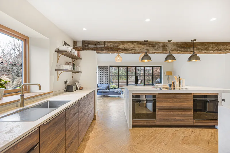 View across the sink and island into the Barn Conversion kitchen