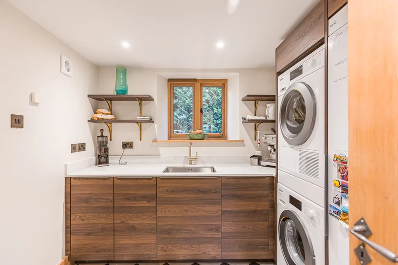 Utility cabinetry within the Barn Conversion project